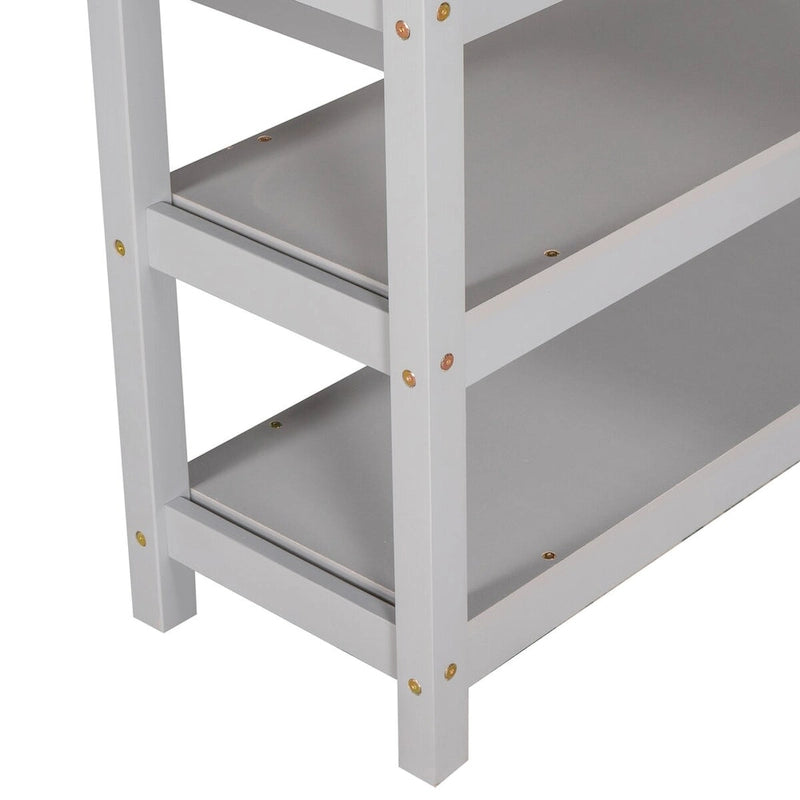 Lit mezzanine gris avec étagères de rangement et bureau sous le lit